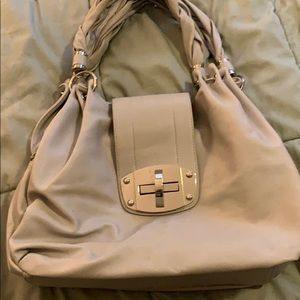 Cream twist lock purse